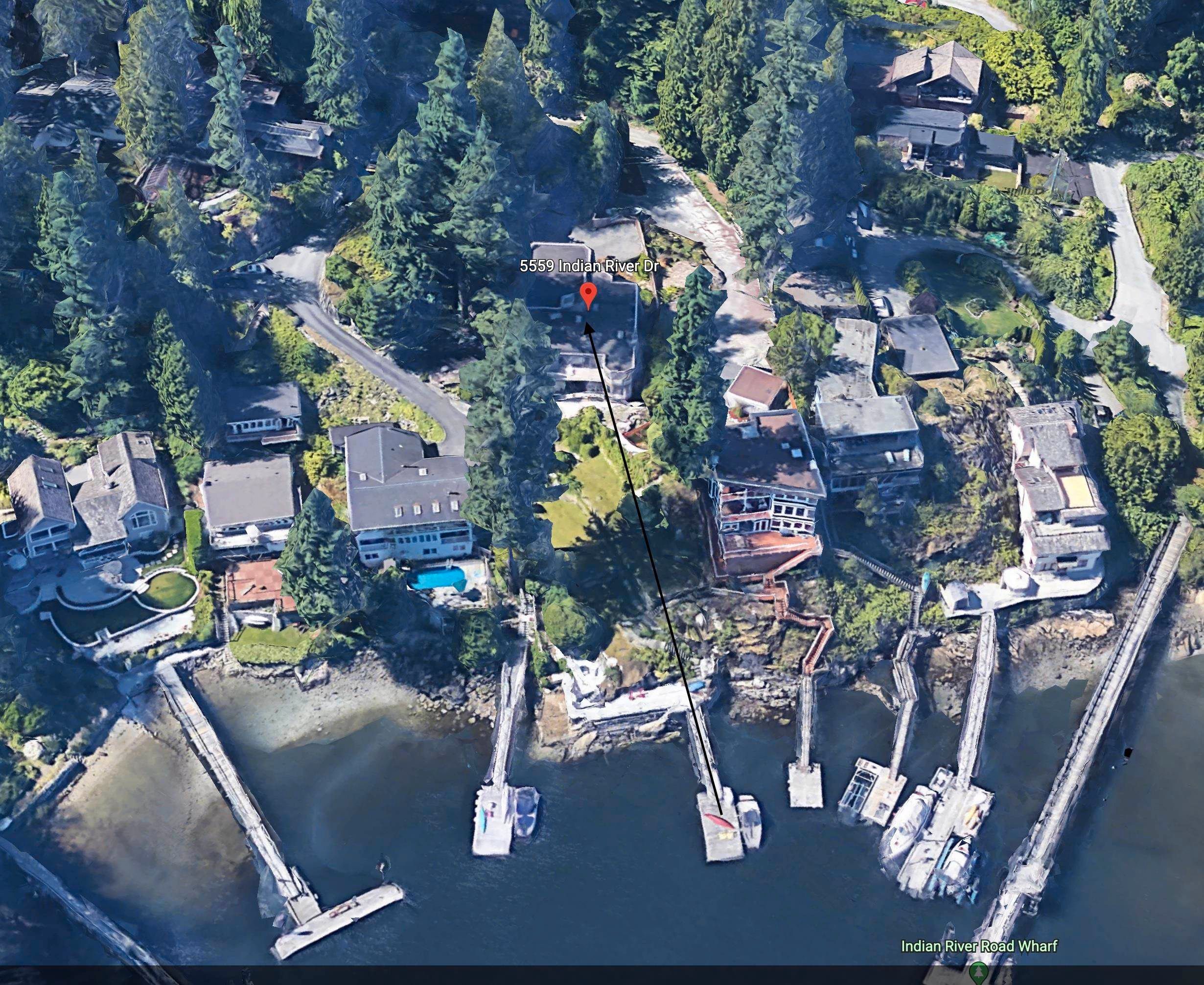 Aerial shot with line from private dock to home.
