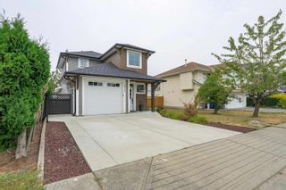 Photo 3: 34711 2ND Avenue in Abbotsford: Poplar House for sale in "Huntingdon Village" : MLS®# R2811781