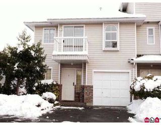 Photo 1: 13957 70TH Ave in Surrey: East Newton Townhouse for sale in "Upton Place" : MLS®# F2700360