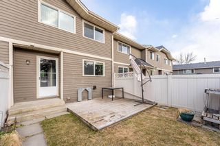 Photo 27: 321 Queenston Heights SE in Calgary: Queensland Row/Townhouse for sale : MLS®# A1201430