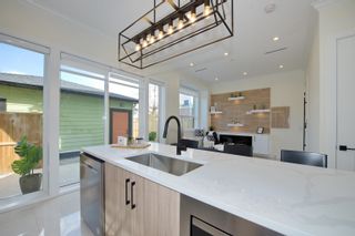 Photo 11: 4935 MOSS Street in Vancouver: Collingwood VE 1/2 Duplex for sale (Vancouver East)  : MLS®# R2678639