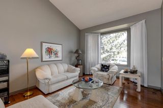 Photo 4: 107 Wood Valley Drive SW in Calgary: Woodbine Detached for sale : MLS®# A1214982