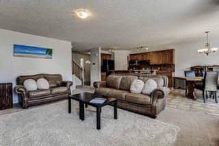 Photo 7: 28 Cougarstone Square SW in Calgary: Cougar Ridge Detached for sale : MLS®# A1099416