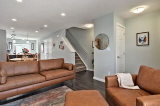 Photo 5: 107 2400 Ravenswood View SE: Airdrie Row/Townhouse for sale : MLS®# A2130554