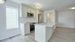 Photo 9: 43 carringwood Manor NW in Calgary: Carrington Row/Townhouse for sale : MLS®# A2123207