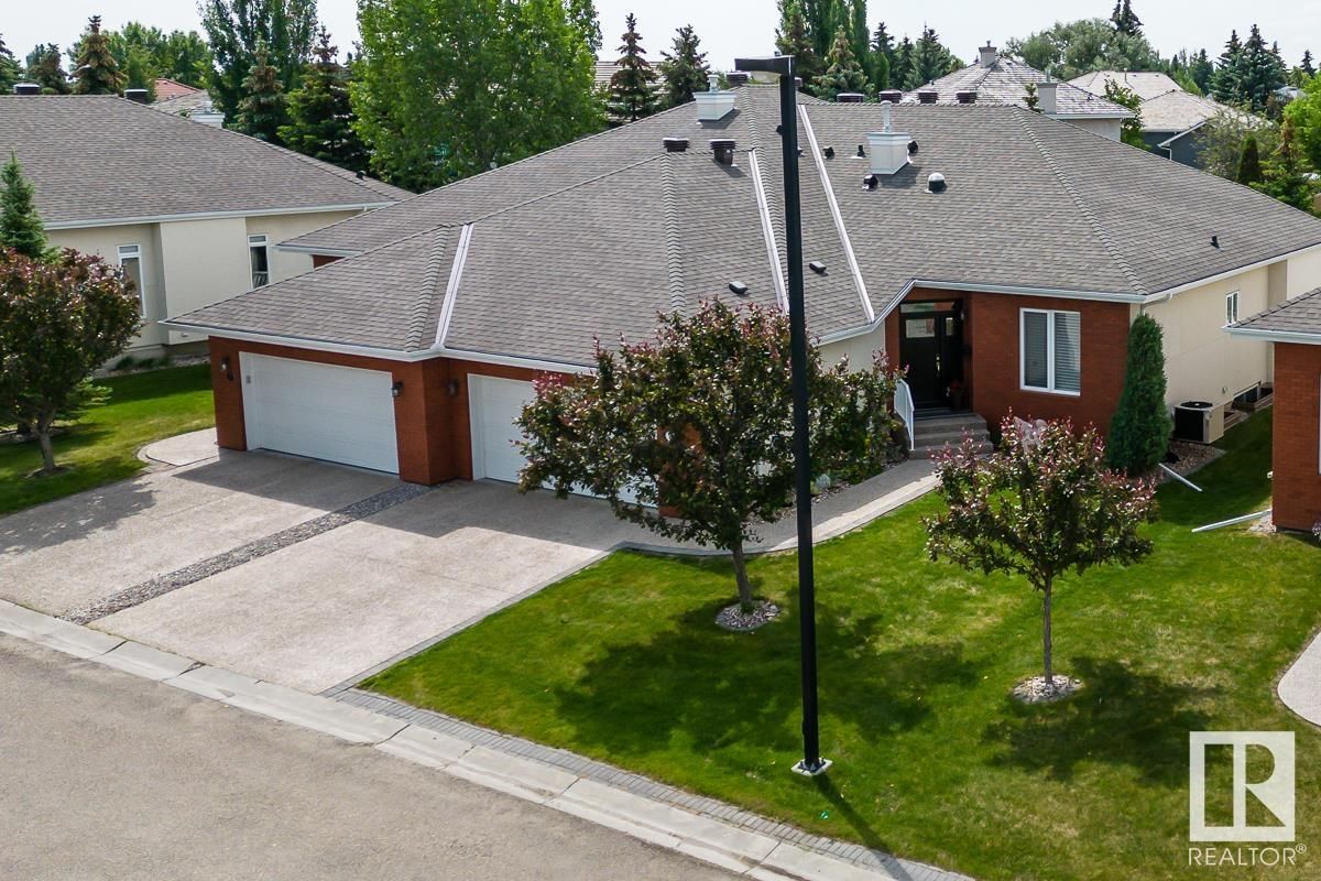 Main Photo: #8 1225 WANYANDI RD NW in Edmonton: Zone 22 House Half Duplex for sale : MLS®# E4344864