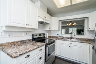 Photo 12: 24 20761 TELEGRAPH Trail in Langley: Walnut Grove Townhouse for sale in "WOODBRIDGE ESTATES" : MLS®# R2682048