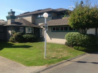 Photo 1: 124 16080 82ND Avenue in Surrey: Fleetwood Tynehead Townhouse for sale in "Ponderosa Estates" : MLS®# F1321774