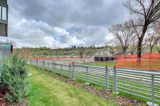 Photo 10: 102 128 Waterfront Court SW in Calgary: Eau Claire Apartment for sale : MLS®# A1232100