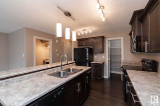 Photo 9: 21205 94 Avenue in Edmonton: Zone 58 House Half Duplex for sale : MLS®# E4384345