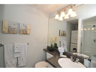 Photo 9: 102 5025 JOYCE Street in Vancouver: Collingwood VE Condo for sale in "GRAND STATION" (Vancouver East)  : MLS®# V904850