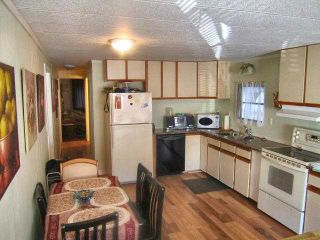 Photo 2: 49 4200 DEWDNEY TRUNK Road in Coquitlam: Ranch Park Manufactured Home for sale in "HIDEAWAY PARK" : MLS®# V902825