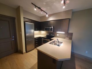 Photo 2: 426 9009 CORNERSTONE Mews in Burnaby: Simon Fraser Univer. Condo for sale in "HUB" (Burnaby North)  : MLS®# R2724994