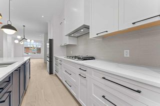 Photo 32: 221 27 Avenue NW in Calgary: Tuxedo Park Semi Detached (Half Duplex) for sale : MLS®# A2101541
