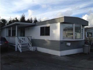 Photo 1: 269 201 CAYER Street in Coquitlam: Maillardville Manufactured Home for sale in "WILDWOOD PARK" : MLS®# V1048740