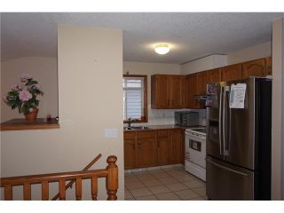 Photo 8: 260 ERIN MEADOW Close SE in Calgary: Erin Woods House for sale : MLS®# C4095343