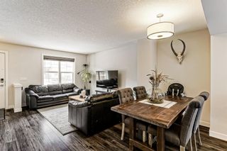 Photo 11: 142 Evanscrest Gardens NW in Calgary: Evanston Row/Townhouse for sale : MLS®# A1211736