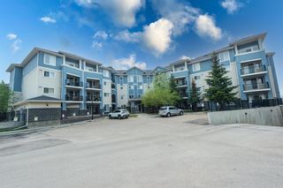 Photo 1: 103 120 Country Village Circle NE in Calgary: Country Hills Village Apartment for sale : MLS®# A2050237