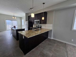 Photo 7: 17 Redstone Circle NE in Calgary: Redstone Row/Townhouse for sale : MLS®# A2130894