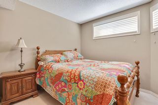Photo 33: 215 Rocky Ridge Villas NW in Calgary: Rocky Ridge Duplex for sale : MLS®# A1256179