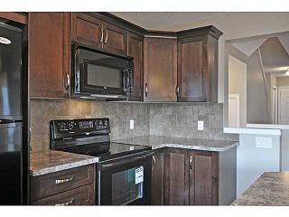 Photo 7: 99 ELGIN MEADOWS Gardens SE in CALGARY: McKenzie Towne Residential Attached for sale (Calgary)  : MLS®# C3545504