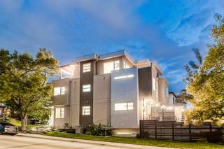 Main Photo: 2102 28 Avenue SW in Calgary: Richmond Semi Detached (Half Duplex) for sale : MLS®# A2055152