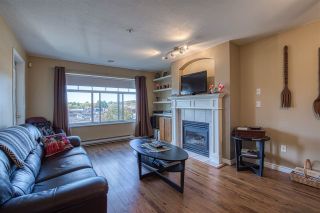 Photo 1: 320 4770 52A Street in Ladner: Delta Manor Condo for sale in "Westham Lane" : MLS®# R2409318