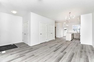 Photo 4: 306 137 Red Embers Link NE in Calgary: Redstone Row/Townhouse for sale : MLS®# A2129689