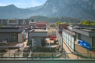 Photo 1: 209 37842 THIRD Avenue in Squamish: Downtown SQ Townhouse for sale in "Lizzy Bay" : MLS®# R2780007