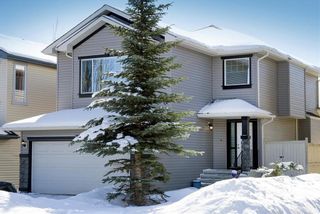 Photo 1: 85 Everbrook Drive SW in Calgary: Evergreen Detached for sale : MLS®# A2031910
