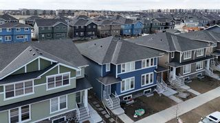 Photo 2: 731 Redstone Drive in Calgary: Redstone Semi Detached (Half Duplex) for sale : MLS®# A2125934