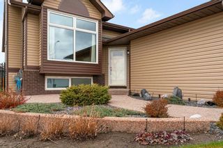 Photo 2: 79 Riverstone Crescent SE in Calgary: Riverbend Detached for sale : MLS®# A2128031