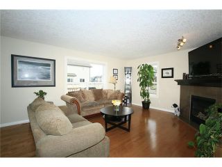 Photo 4: 1857 BAYWATER Street SW: Airdrie House for sale : MLS®# C4104542