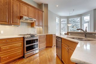 Photo 11: 25 Everglade Place SW in Calgary: Evergreen Detached for sale : MLS®# A2063264
