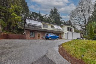 Photo 1: 13243 COULTHARD Road in Surrey: Panorama Ridge House for sale in "Panorama Ridge" : MLS®# R2880618