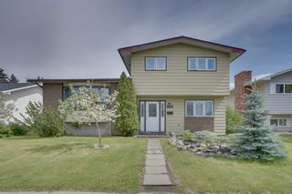 Photo 1: 208 Queensland Circle SE in Calgary: Queensland Detached for sale : MLS®# A2136528