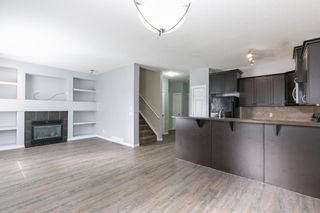 Photo 5: 58 Arbours Circle NW: Langdon Row/Townhouse for sale : MLS®# A1137898