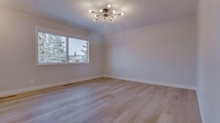 Photo 18: 215 Tache Avenue NW in Calgary: Thorncliffe Detached for sale : MLS®# A2021905