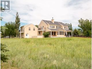 Photo 2: 221 Falcon Ridge Way in Rural Lethbridge County: House for sale : MLS®# A2016940