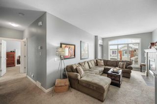 Photo 4: 404 8000 Wentworth Drive SW in Calgary: West Springs Row/Townhouse for sale : MLS®# A2128381