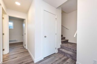 Main Photo: 9 Spring Creek Common SW in Calgary: Springbank Hill Row/Townhouse for sale : MLS®# A2097988