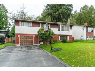 Photo 2: 9159 APPLEHILL Crescent in Surrey: Queen Mary Park Surrey House for sale : MLS®# R2407744