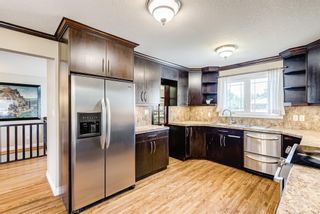 Photo 1: 8248 4A Street SW in Calgary: Kingsland Detached for sale : MLS®# A1165175