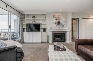 Photo 1: 309 2733 ATLIN Place in Coquitlam: Coquitlam East Condo for sale in "Atlin Court" : MLS®# R2355096