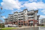 Main Photo: 104 45511 CAMPUS Drive in Chilliwack: Garrison Crossing Condo for sale in "York Residences" (Sardis)  : MLS®# R2861430