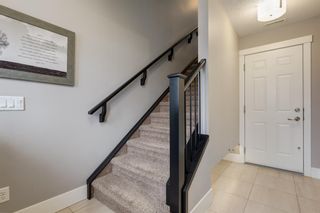Photo 7: 460 Quarry Way SE in Calgary: Douglasdale/Glen Row/Townhouse for sale : MLS®# A2021657