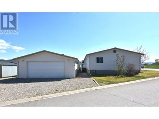 Photo 1: 12560 Westside Road Unit# 118 in Vernon: House for sale : MLS®# 10306327