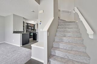 Photo 5: 212 Walden Drive SE in Calgary: Walden Row/Townhouse for sale : MLS®# A1236888