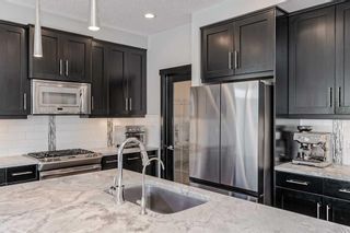 Photo 12: 262 Tremblant Way SW in Calgary: Springbank Hill Detached for sale : MLS®# A2131137