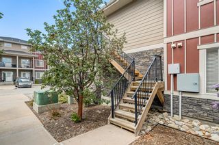 Photo 4: 7 51 West Coach Manor SW in Calgary: West Springs Row/Townhouse for sale : MLS®# A2051975